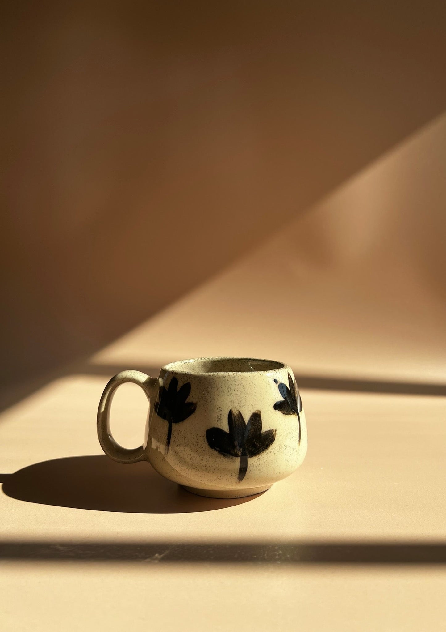 Noir Petal . Pebble Mug