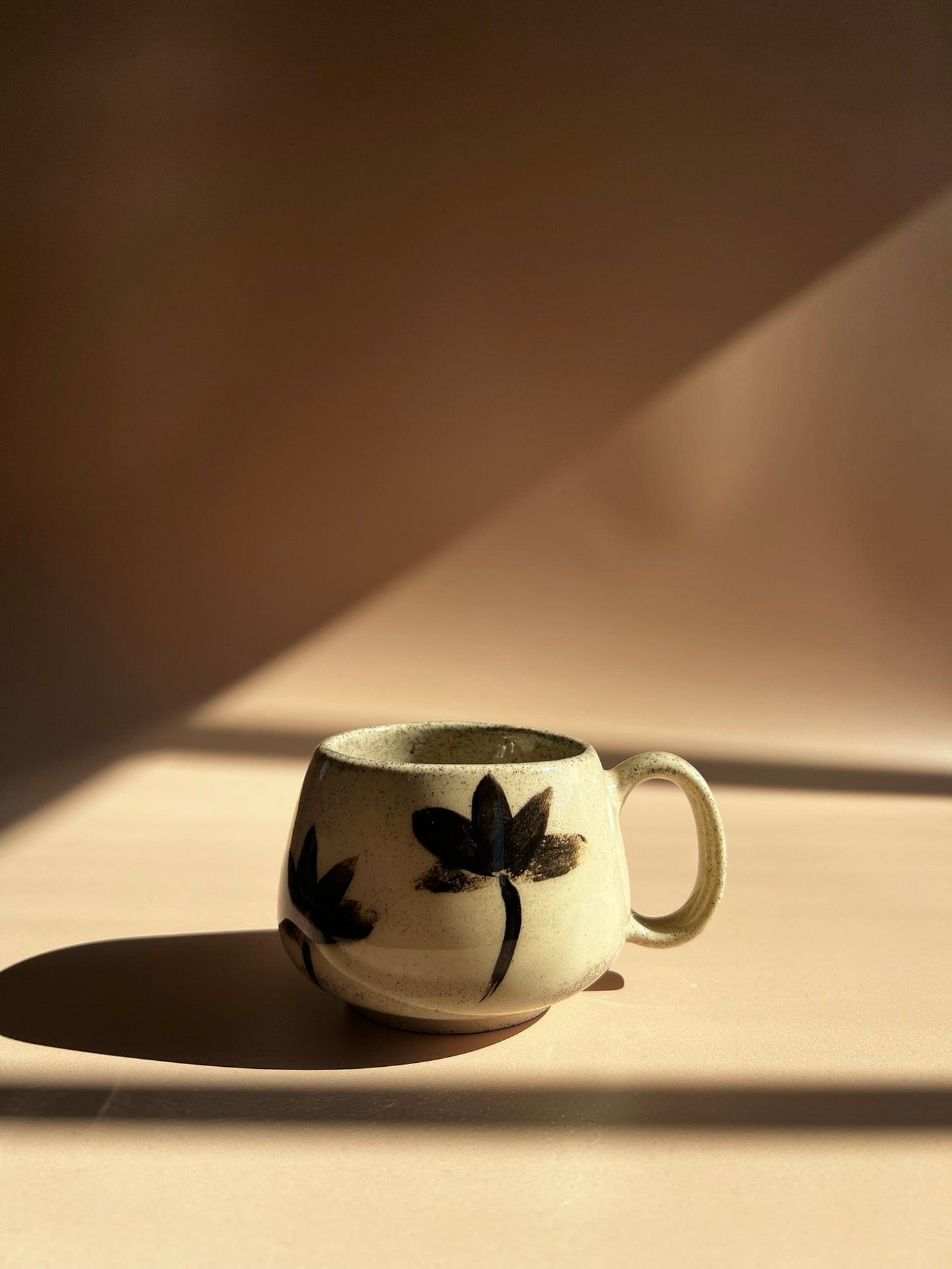 Noir Petal . Pebble Mug