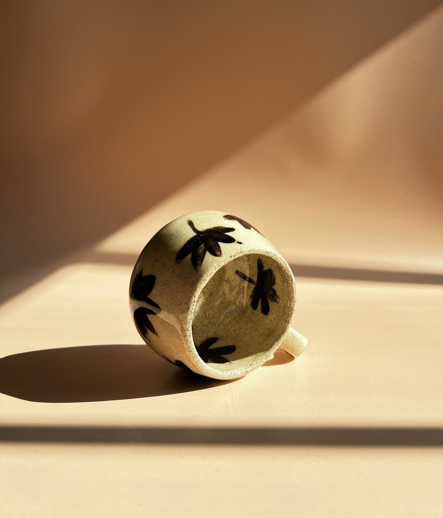 Noir Petal . Pebble Mug