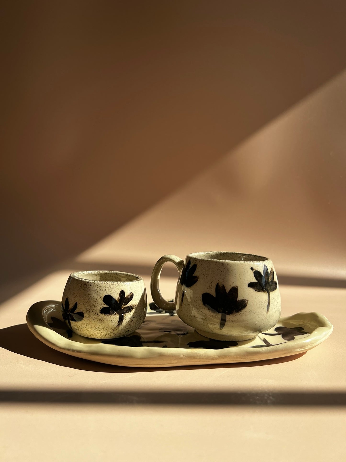 Noir Petal . Pebble Mug